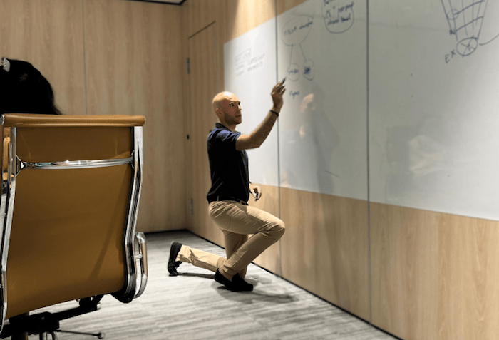 Max at the whiteboard